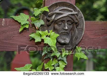"Christian carvings, Jesus with a crown of thorns, historic woodland cemetery """"stomping ground"""", military cemetery, Innsbruck, Tyrol, Austria, Europe" View Large Photo Image Stock Image - "Christian carvings, Jesus with a crown of thorns, historic woodland cemetery """"stomping ground"""", military cemetery, Innsbruck, Tyrol, Austria, Europe". Fotosearch