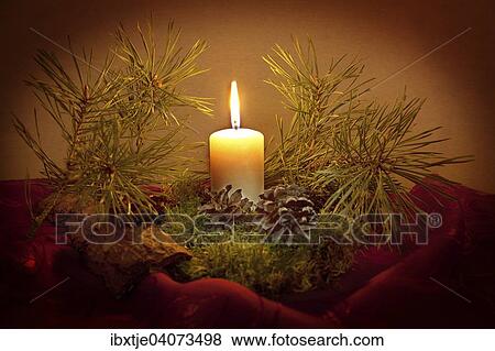 Stock Photo - Christmas still life with candlelight. Fotosearch