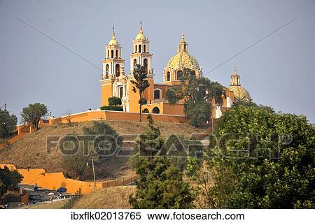 "Church of Iglesia Nuestra Senora de los Remedios on the ruins of the pre-Hispanic Pyramid of Cholula, San Pedro Cholula, Puebla, Mexico, Latin America, North America" View Large Photo Image Stock Photography - "Church of Iglesia Nuestra Senora de los Remedios on the ruins of the pre-Hispanic Pyramid of Cholula, San Pedro Cholula, Puebla, Mexico, Latin America, North America". Fotosearch