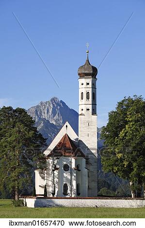 "Church of St. Coloman or Colomanskirche, Schwangau, in front of the Tannheimer Mountains, Ostallgaeu, Allgaeu, Schwaben, Bavaria, Germany, Europe" View Large Photo Image Stock Image - "Church of St. Coloman or Colomanskirche, Schwangau, in front of the Tannheimer Mountains, Ostallgaeu, Allgaeu, Schwaben, Bavaria, Germany, Europe". Fotosearch
