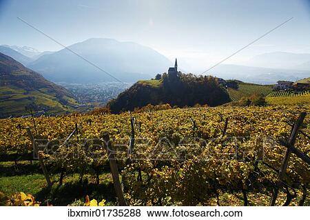 "Church of St. George, view of the valley and Bolzano in autumn, Jenesien, San Genesio, province of Bolzano-Bozen, South Tyrol, Italy, Europe" View Large Photo Image Stock Photo - "Church of St. George, view of the valley and Bolzano in autumn, Jenesien, San Genesio, province of Bolzano-Bozen, South Tyrol, Italy, Europe". Fotosearch