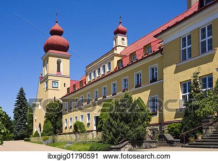 Stock Image - "Church of St. Joseph and the Convent of the Sisters of St Elizabeth in Jablunkov, Frydek-Mistek district, Moravskoslezsky region, Czech Republic, Europe". Fotosearch