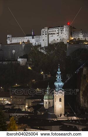 Picture - "Church of St. Peter and Hohensalzburg Fortress, night shot, Salzburg, Austria, Europe". Fotosearch