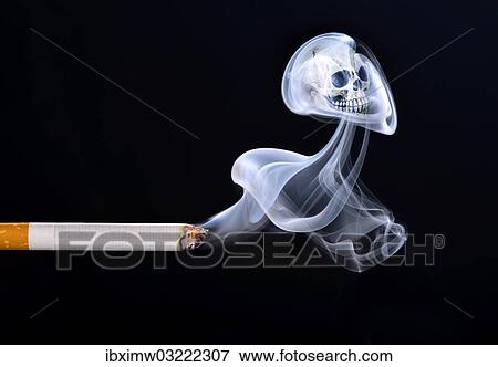Stock Photo - "Cigarette with smoke and a skull, smoking kills, symbolic image of death from smoking, Germany, Europe". Fotosearch