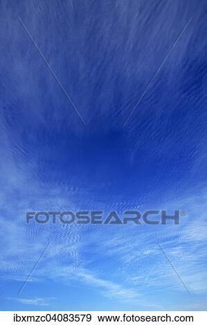 "Cirrus, cirrus floccusam, in a blue sky" View Large Photo Image Stock Photo - "Cirrus, cirrus floccusam, in a blue sky". Fotosearch