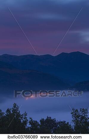 Stock Photo - "City in fog, Preci, Umbria, Italy, Europe". Fotosearch