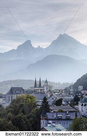 Stock Image - "City view with parish church of St. Andreas and the twin towers of the collegiate church of St. Peter und Johannes der Taeufer, Mt. Watzmann in the back, Berchtesgaden, Berchtesgadener Land, Upper Bavaria, Bavaria, Germany, Europe". Fotosearch