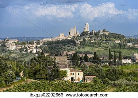 Stock Photograph - "Cityscape of San Gimignano, towers of San Gimignano, Tuscan landscape, Tuscany, Italy, Europe". Fotosearch