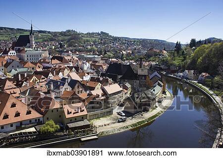 Stock Image - "Cityscape with St. Vitus Church from the castle tower, Vltava River in the foreground, Cesky Krumlov, Jihocesky kraj, South Bohemia, Czech Republic, Europe". Fotosearch