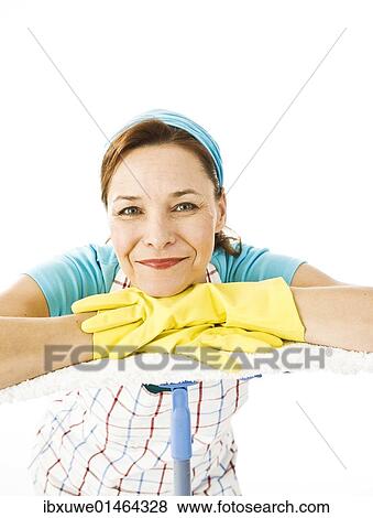 Cleaning lady at work View Large Photo Image Stock Photo - Cleaning lady at work. Fotosearch