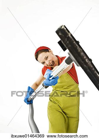 Cleaning lady at work View Large Photo Image Stock Photo - Cleaning lady at work. Fotosearch