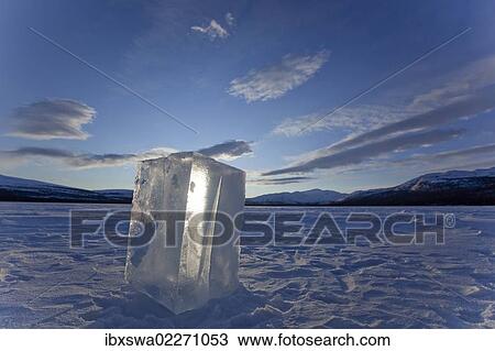 "Clear ice cube on frozen Fish Lake, cut out with a chain saw, Yukon Territory, Canada, North America" View Large Photo Image Stock Image - "Clear ice cube on frozen Fish Lake, cut out with a chain saw, Yukon Territory, Canada, North America". Fotosearch