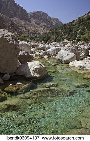 "Clear water in the Wadi Shab mountain ravine, Hadjar-Gebirge, Hadschar-Gebirge, Tiwi, Oman, Asia" View Large Photo Image Stock Photo - "Clear water in the Wadi Shab mountain ravine, Hadjar-Gebirge, Hadschar-Gebirge, Tiwi, Oman, Asia". Fotosearch
