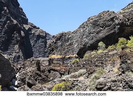 Stock Photo - "Cliff in the Masca Gorge, volcanic rock, Tenerife, Canary Islands, Spain, Europe". Fotosearch