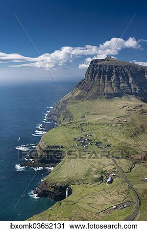 "Cliffs and a small village, Gasadalur, Vagar, Faroe Islands, Denmark, Europe" View Large Photo Image Stock Image - "Cliffs and a small village, Gasadalur, Vagar, Faroe Islands, Denmark, Europe". Fotosearch