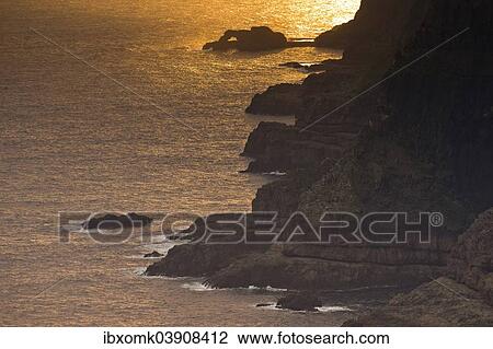 "Cliffs and sea in evening light, near Lopra, Suouroy, Faroe Islands, Denmark, Europe" View Large Photo Image Stock Image - "Cliffs and sea in evening light, near Lopra, Suouroy, Faroe Islands, Denmark, Europe". Fotosearch
