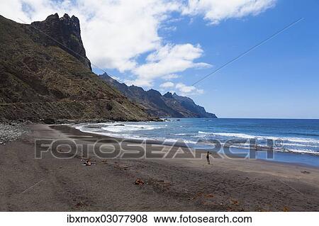 Stock Photo - "Cliffs in the Anaga Mountains with the Playa de Roque de las Bodegas beach at the village of Taganana, Almaciga, Almaciga, Tenerife, Canary Islands, Spain, Europe". Fotosearch