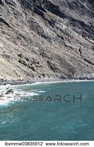 "Cliffs of the Masca Gorge leading into the sea, black sand beach, Tenerife, Canary Islands, Spain, Europe" View Large Photo Image Stock Image - "Cliffs of the Masca Gorge leading into the sea, black sand beach, Tenerife, Canary Islands, Spain, Europe". Fotosearch