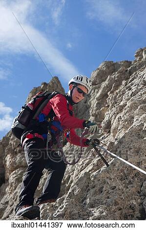 Stock Photo - "Climber on the Masara-Corda Rossa via ferrata, Dolomites, South Tyrol, Italy, Europe". Fotosearch