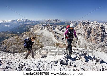 "Climbers, ascent of the Tofane di Roze on the Giovanni Lipella via ferrata, behind the Sella and the Gardena, left the Marmolada, Dolomites, Cortina d'Ampezzo, Province of Belluno, Veneto, Italy, Europe" View Large Photo Image Stock Photo - "Climbers, ascent of the Tofane di Roze on the Giovanni Lipella via ferrata, behind the Sella and the Gardena, left the Marmolada, Dolomites, Cortina d'Ampezzo, Province of Belluno, Veneto, Italy, Europe". Fotosearch