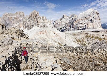 "Climbers descending from Lagazuoi over the Galleria Lagazuoi in the Fanesgroup at the Falzarego Pass, behind the Tofane, also Tofana di Roze, Tofana di Mezzo, Tofana di Dentro, and the Southern Fanes peak, Province of Belluno, Dolomites, Italy, Europe" View Large Photo Image Stock Photo - "Climbers descending from Lagazuoi over the Galleria Lagazuoi in the Fanesgroup at the Falzarego Pass, behind the Tofane, also Tofana di Roze, Tofana di Mezzo, Tofana di Dentro, and the Southern Fanes peak, Province of Belluno, Dolomites, Italy, Europe". Fotosearch