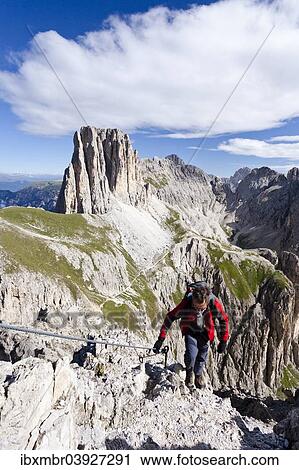 "Climbers during the ascent to the Croda Rossa in the Rose Garden Group over the Croda Rossa via ferrata, below the Vaiolonpass, behind the Tscheiner peaks, Dolomites, Province of South Tyrol, Italy, Europe" View Large Photo Image Stock Image - "Climbers during the ascent to the Croda Rossa in the Rose Garden Group over the Croda Rossa via ferrata, below the Vaiolonpass, behind the Tscheiner peaks, Dolomites, Province of South Tyrol, Italy, Europe". Fotosearch