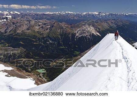 "Climbers on the summit ridge of Piz Palue Mountain, Grisons, Switzerland, Europe" View Large Photo Image Stock Image - "Climbers on the summit ridge of Piz Palue Mountain, Grisons, Switzerland, Europe". Fotosearch