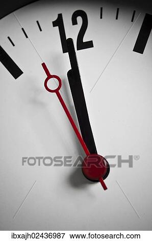 "Clock, shortly before twelve, symbolic image of a deadline looming, time running out, time pressure" View Large Photo Image Stock Photo - "Clock, shortly before twelve, symbolic image of a deadline looming, time running out, time pressure". Fotosearch