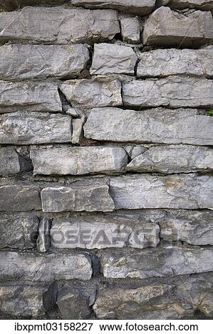 Stock Photo - "Close-up of a flagstone wall, Montreal, Quebec Province, Canada, North America". Fotosearch