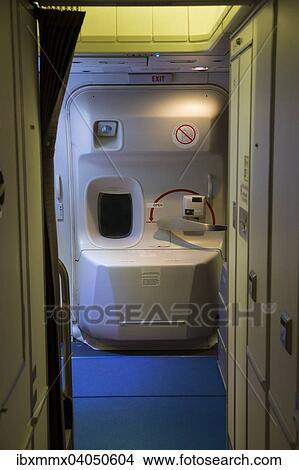 Closed aircraft door of a widebody aircraft during flight View Large Photo Image Picture - Closed aircraft door of a widebody aircraft during flight. Fotosearch