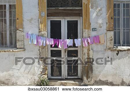 "Clothesline with pink underwear hanging out to dry in front of an old door, Burg St. Hilarion, Nikosia, Turkische Republik Nordzypern, Cyprus, Europe" View Large Photo Image Stock Image - "Clothesline with pink underwear hanging out to dry in front of an old door, Burg St. Hilarion, Nikosia, Turkische Republik Nordzypern, Cyprus, Europe". Fotosearch