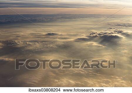 "Cloud formations in the evening light, Germany, Europe" View Large Photo Image Picture - "Cloud formations in the evening light, Germany, Europe". Fotosearch