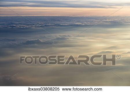 Stock Photography - "Cloud formations in the evening light, Germany, Europe". Fotosearch