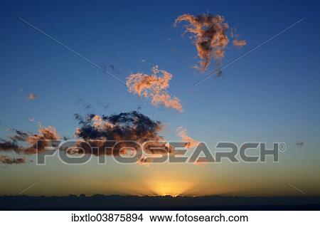 Cloud formations in the evening View Large Photo Image Picture - Cloud formations in the evening. Fotosearch