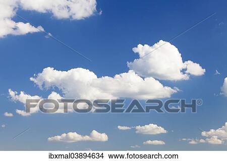 Clouds against a blue sky View Large Photo Image Picture - Clouds against a blue sky. Fotosearch