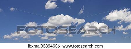 Clouds against a blue sky View Large Photo Image Stock Photography - Clouds against a blue sky. Fotosearch