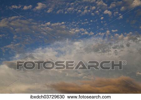 Stock Image - "Clouds, evening sky, Bondville, Eastern Townships, Quebec Province, Canada, North America". Fotosearch