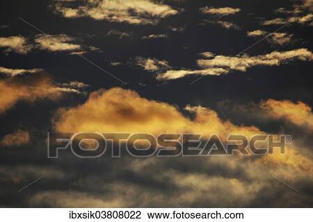 "Clouds in the sky at dawn, Germany, Europe" View Large Photo Image Stock Image - "Clouds in the sky at dawn, Germany, Europe". Fotosearch