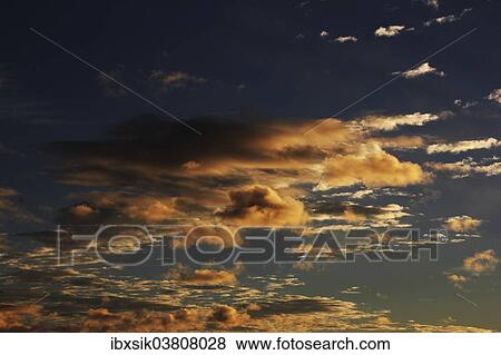 "Clouds in the sky at dawn, Germany, Europe" View Large Photo Image Stock Photo - "Clouds in the sky at dawn, Germany, Europe". Fotosearch