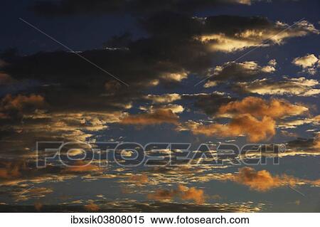 "Clouds in the sky at dawn, Germany, Europe" View Large Photo Image Stock Photography - "Clouds in the sky at dawn, Germany, Europe". Fotosearch