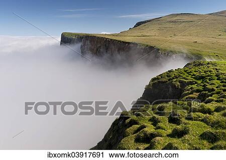 "Clouds on the cliffs, Mykines, Utoyggjar, Faroe Islands, Denmark, Europe" View Large Photo Image Stock Image - "Clouds on the cliffs, Mykines, Utoyggjar, Faroe Islands, Denmark, Europe". Fotosearch