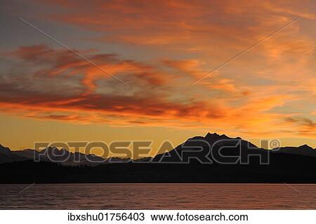 "Cloudy atmosphere over Lake Zug looking towards Pilatus Mountain, Zug, Central Switzerland, Switzerland, Europe" View Large Photo Image Stock Image - "Cloudy atmosphere over Lake Zug looking towards Pilatus Mountain, Zug, Central Switzerland, Switzerland, Europe". Fotosearch