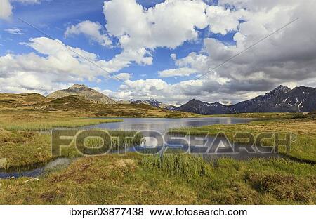 "Cloudy sky at Jaufenpass, Passo di Monte Giovo, mountain lake, Sterzing, South Tyrol, Italy, Europe" View Large Photo Image Stock Photo - "Cloudy sky at Jaufenpass, Passo di Monte Giovo, mountain lake, Sterzing, South Tyrol, Italy, Europe". Fotosearch