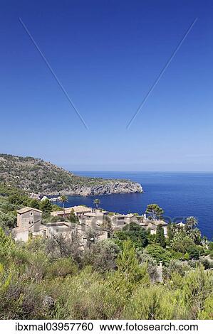 Stock Image - "Coast, hamlet by the sea, Lluc Alcari, near Deia, Sierra de Tramuntana, west coast, Majorca, Balearic Islands, Spain, Europe". Fotosearch