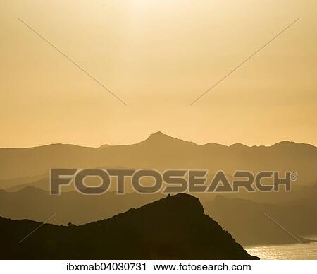 "Coastal silhouette, sunset, Gulf of Saint-Florent, Corsica, France, Europe" View Large Photo Image Stock Image - "Coastal silhouette, sunset, Gulf of Saint-Florent, Corsica, France, Europe". Fotosearch