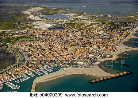 "Coastline, city centre, Saintes-Maries-de-la-Mer, Camargue, Provence-Alpes-Cote d'Azur, France, Europe" View Large Photo Image Stock Photo - "Coastline, city centre, Saintes-Maries-de-la-Mer, Camargue, Provence-Alpes-Cote d'Azur, France, Europe". Fotosearch