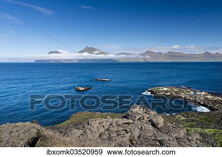 "Coastline, Kalsoy island at back, Djupini, Gjogv, Eysturoy, Faroe Islands, Denmark, Europe" View Large Photo Image Stock Photo - "Coastline, Kalsoy island at back, Djupini, Gjogv, Eysturoy, Faroe Islands, Denmark, Europe". Fotosearch