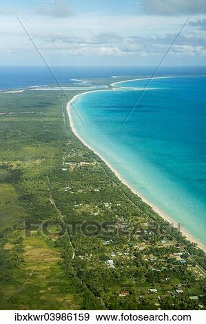 "Coastline with beach and village, Ouvea island, New Caledonia, Oceania" View Large Photo Image Stock Photo - "Coastline with beach and village, Ouvea island, New Caledonia, Oceania". Fotosearch