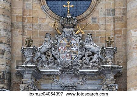 "Coat of arms of Friedrich Carl von Schonborn above the entrance of the Gossweinstein pilgrimage church of the Holy Trinity, consecrated in 1739, built by architect Baltasar Neumann, Gossweinstein, Upper Franconia, Bavaria, Germany, Europe" View Large Photo Image Stock Photo - "Coat of arms of Friedrich Carl von Schonborn above the entrance of the Gossweinstein pilgrimage church of the Holy Trinity, consecrated in 1739, built by architect Baltasar Neumann, Gossweinstein, Upper Franconia, Bavaria, Germany, Europe". Fotosearch