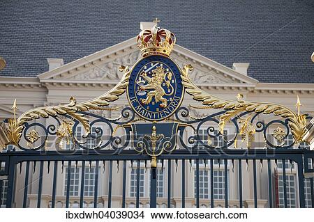 Picture - "Coat of arms with a crown, on the fence in front of Noordeinde Palace, royal palace, The Hague, Holland, The Netherlands, Europe". Fotosearch